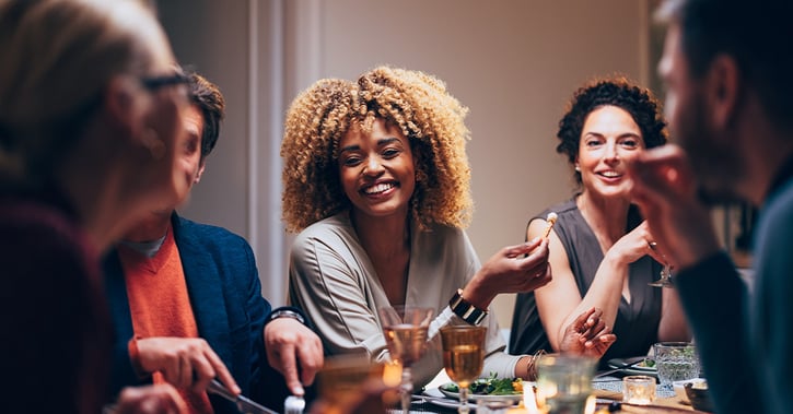 Group Of Friends Having Fun During A Dinner Celebration