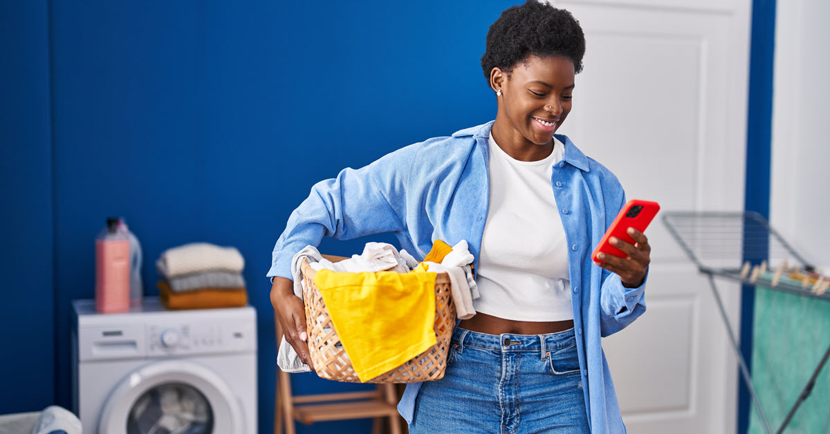 Woman in laundry room on phone