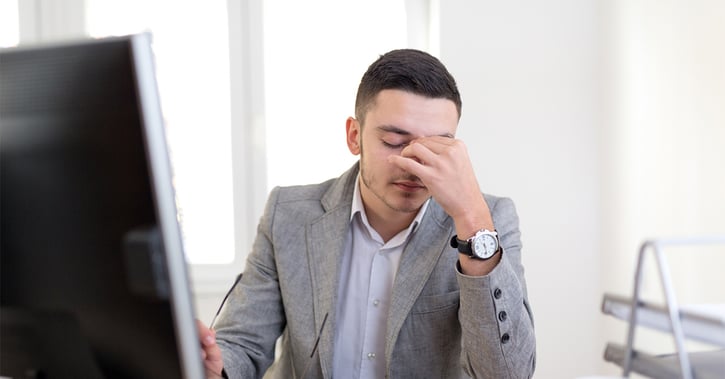 Stressed young businessman