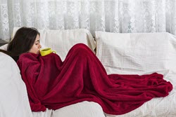 woman wrapped in blanket