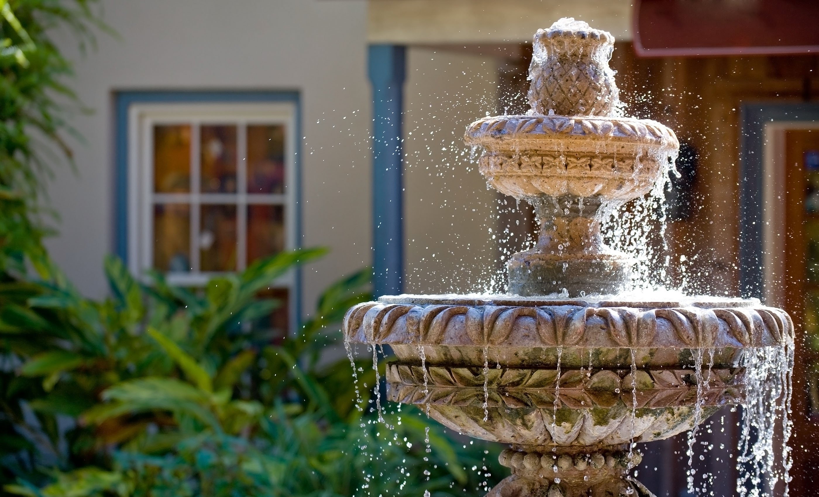 An ornamental fountain outside a buyer's new home.