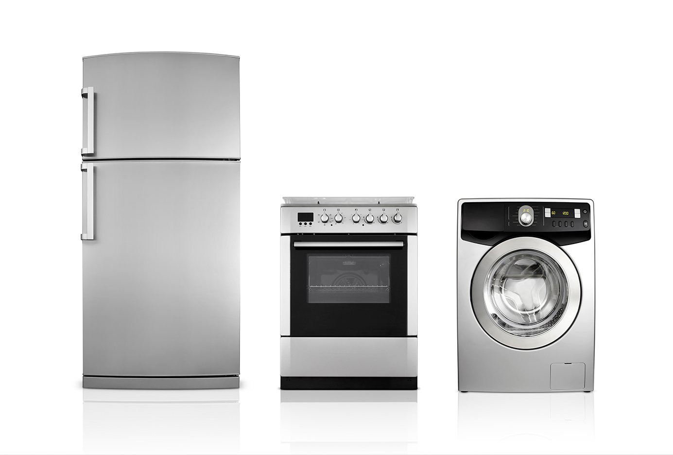 A kitchen refrigerator, an oven, and a washing machine.