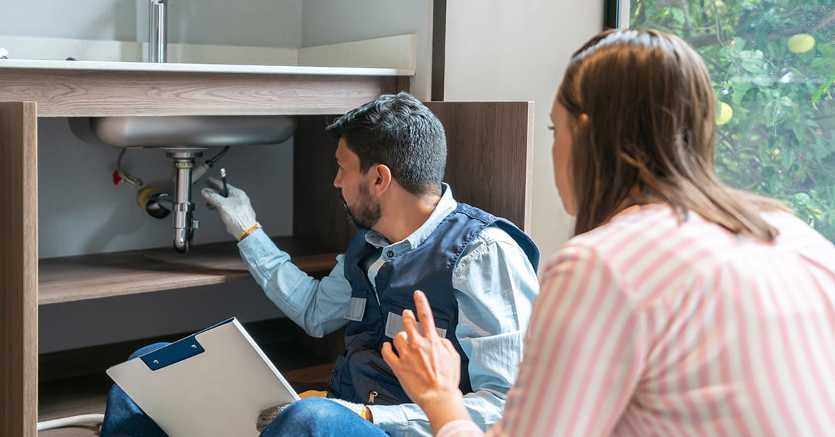Plumber Contractor Fixing Pipe